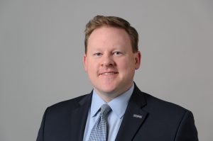 Portrait of a man in a suit and tie