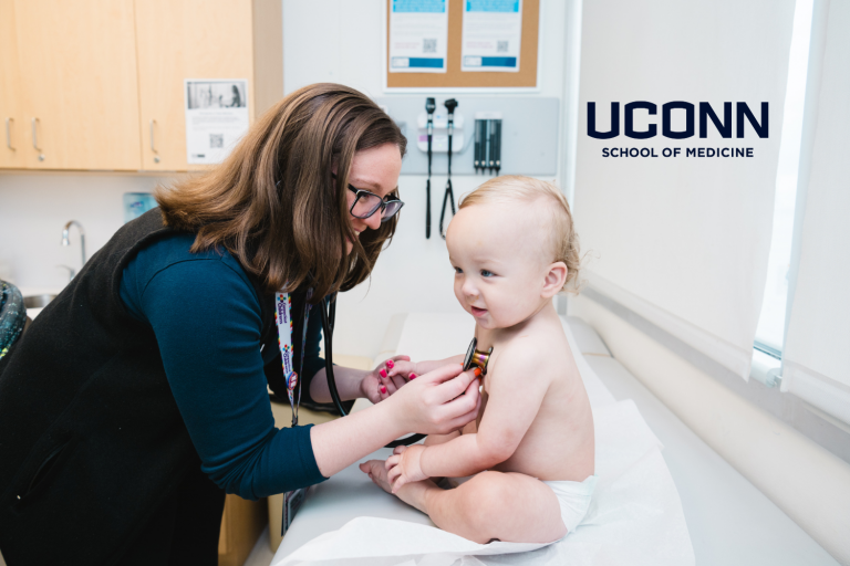 Dr. Katherine Phillips with baby patient.