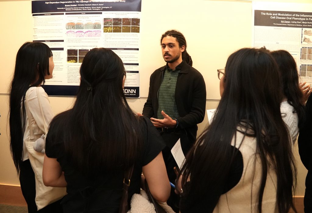 Students presenting posters.
