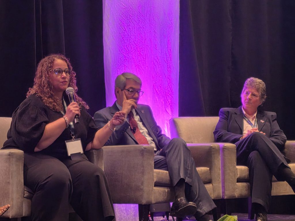 On a panel Dr Sprague Martinez speaking