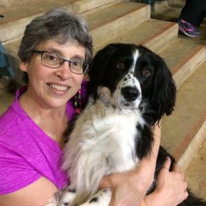 Nancy and her black and white dog