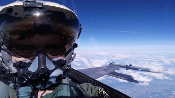 Dr. Sloan inflight in Air Force.