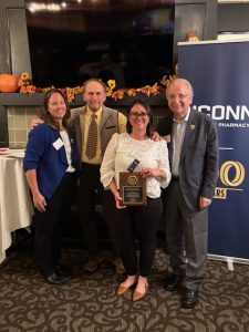 Samantha Russo with her award