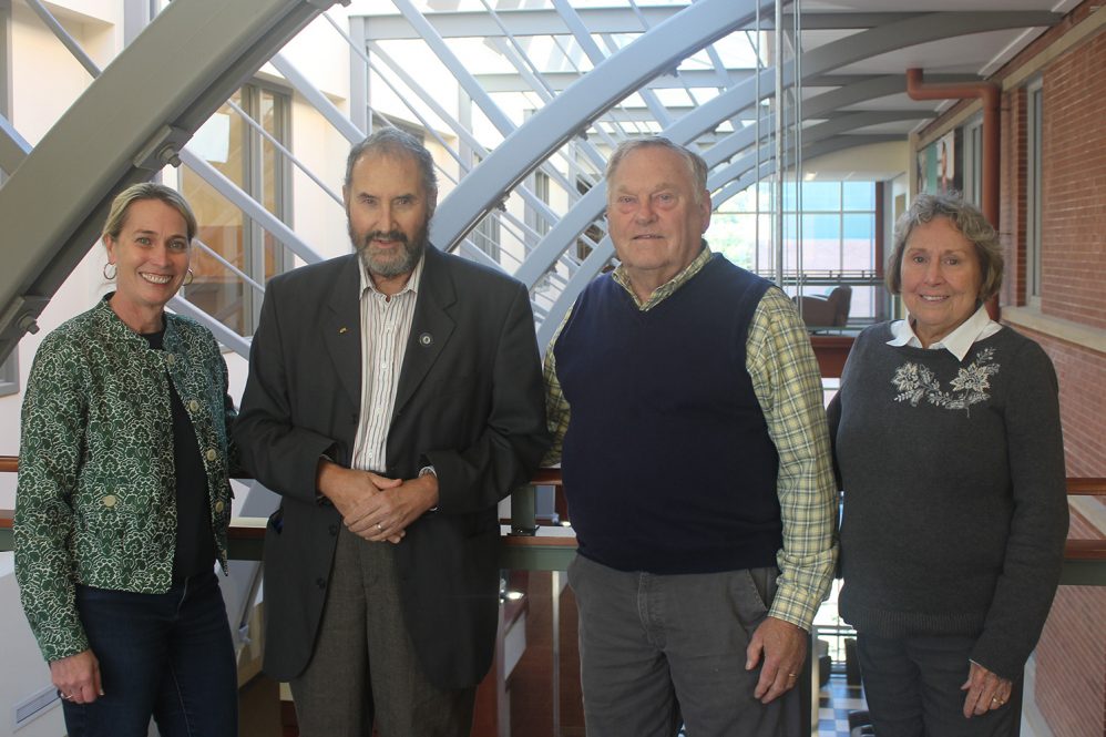 Patti Hess, David Stoloff, Duffy Brooks Duffy Brookes ’68 (ED), former chapter historian; and Laurie Brookes gather in the Gentry Building.