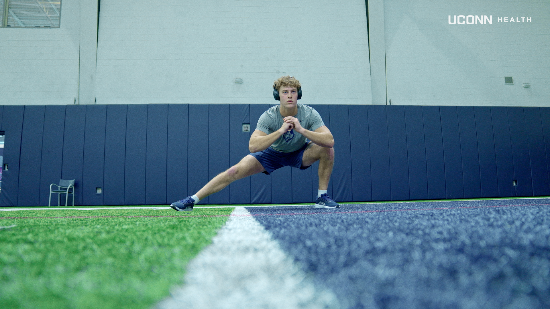 UConn football wide receiver Jackson Harper physically and mentally preparing before a workout. (Ethan Giorgetti/UConn Health)