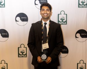 Lahar proudly holds his award (contributed photo)