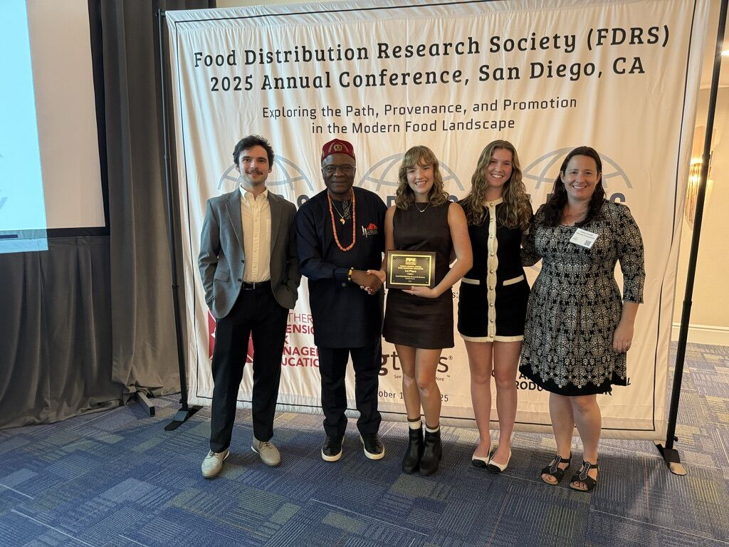 UConn's winning team accepting their award
