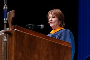 Cheryl Ficara speaking at commencement ceremony.