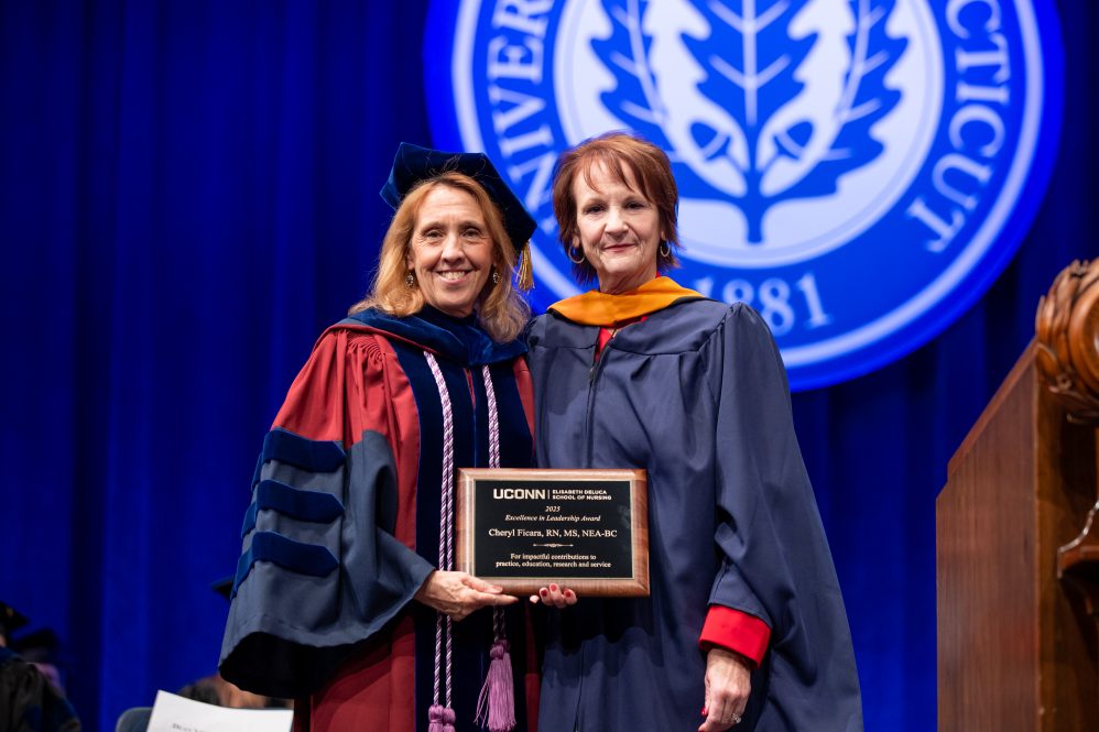 Elisabeth DeLuca School of Nursing Dean, Victoria Vaughan Dickson and Cheryl Ficara at the UConn Nursing Accelerated Second-Degree CEIN/BS commencement ceremony.
