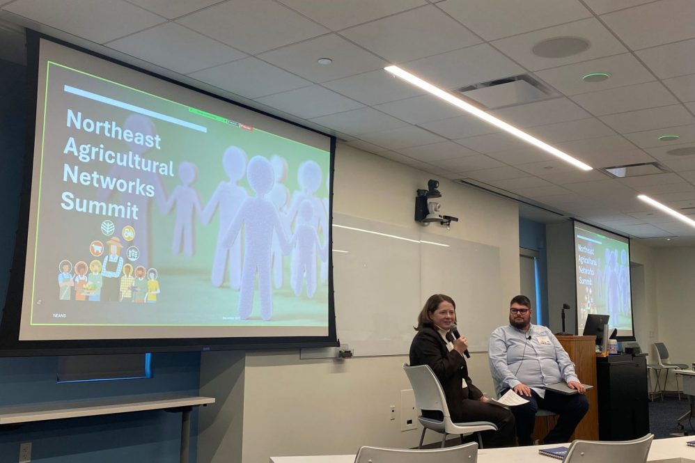 People presenting at an educational summit