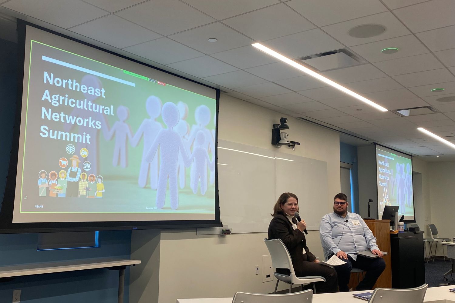 People presenting at an educational summit