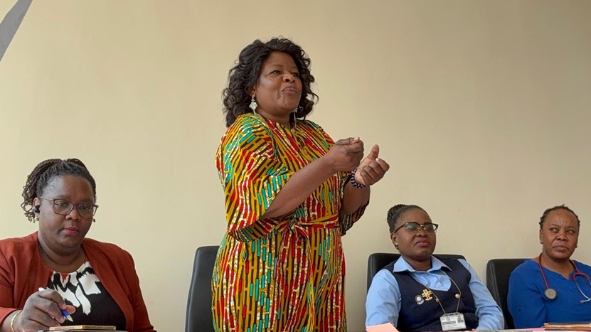 Standing is Zambia's University Teaching Hospital's Dr. Veronica Sunkuta Sichizya