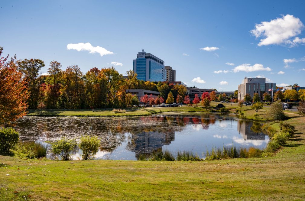 UConn Health campus near the pond during fall.