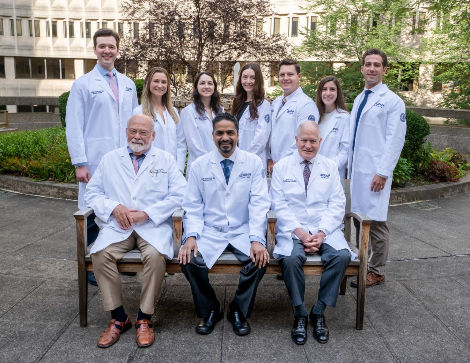 group of dentists in white coats