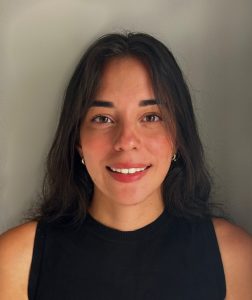 Veronica Arroyo Rodriguez smiling in black tank top.