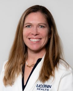 Dr. Lauren Geaney studio portrait white coat