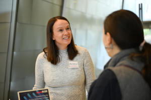woman standing and talking
