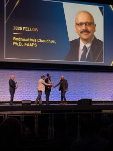 Bodhi receiving his fellowship at the PharmSci 360 Meeting