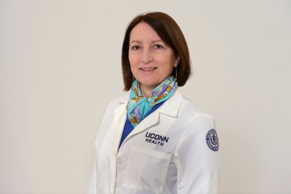 Blanka Rogina, Ph.D. in white coat