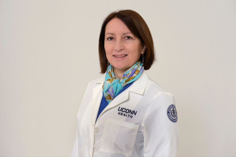 Blanka Rogina, Ph.D. in white coat