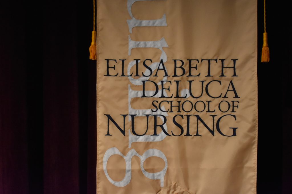 UConn Elisabeth DeLuca School of Nursing flag