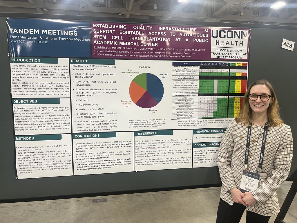 Elizabeth Higgins, RN with poster.