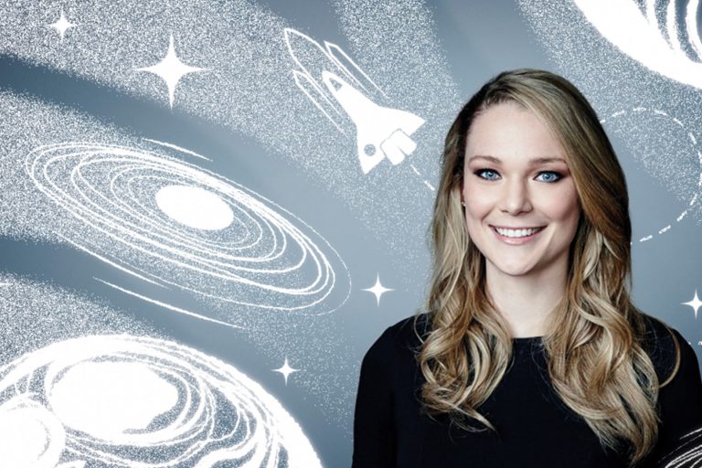 Jackie Wattes smiles in front of an illustrated backdrop of solar system and rocket ship.