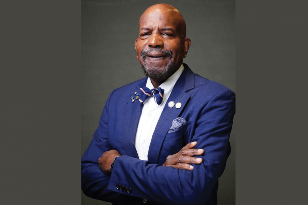 Dr. Cato T. Laurencin of UConn in blue suit with arms crossed.