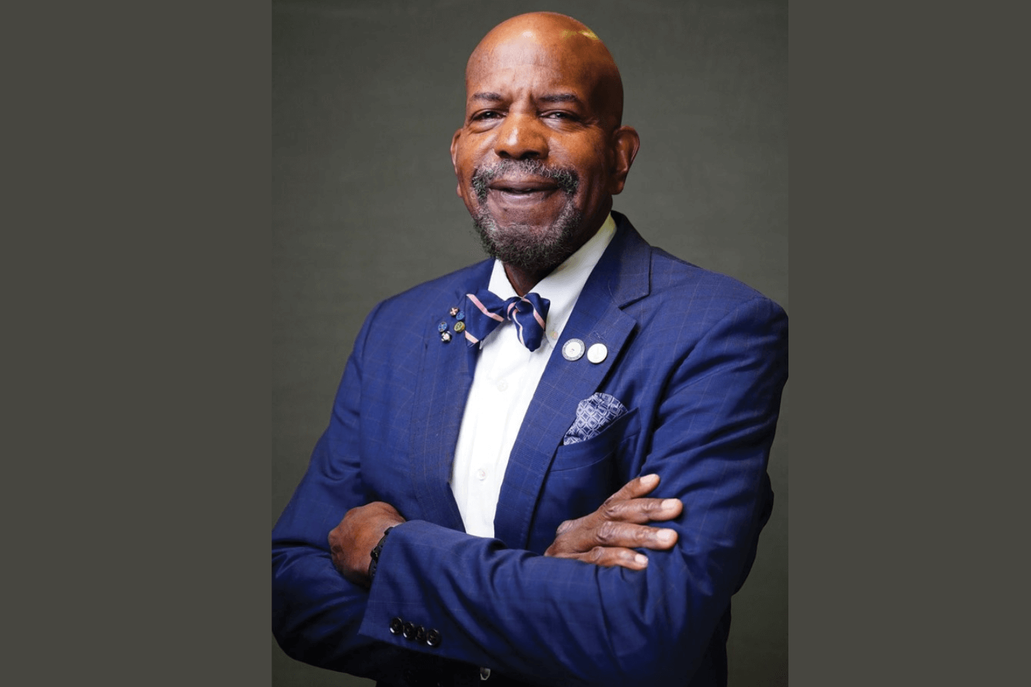Dr. Cato T. Laurencin of UConn in blue suit with arms crossed.
