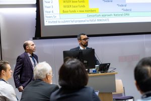 Two men presenting a lecture.