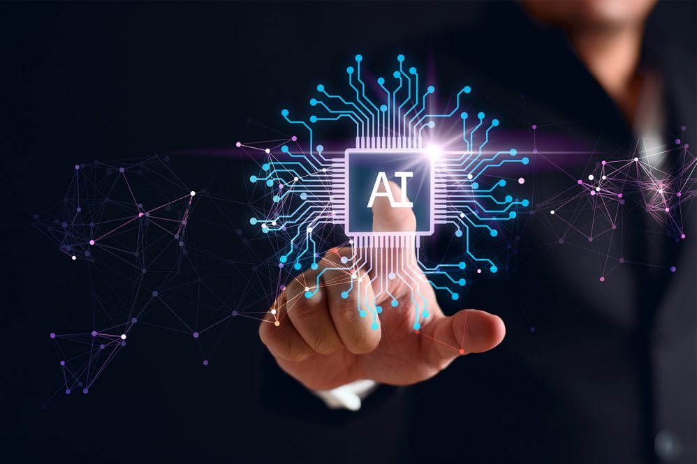 Artificial intelligence AI circuit board in shape electronic PCB circuit icon symbol on businessman hand finger touching