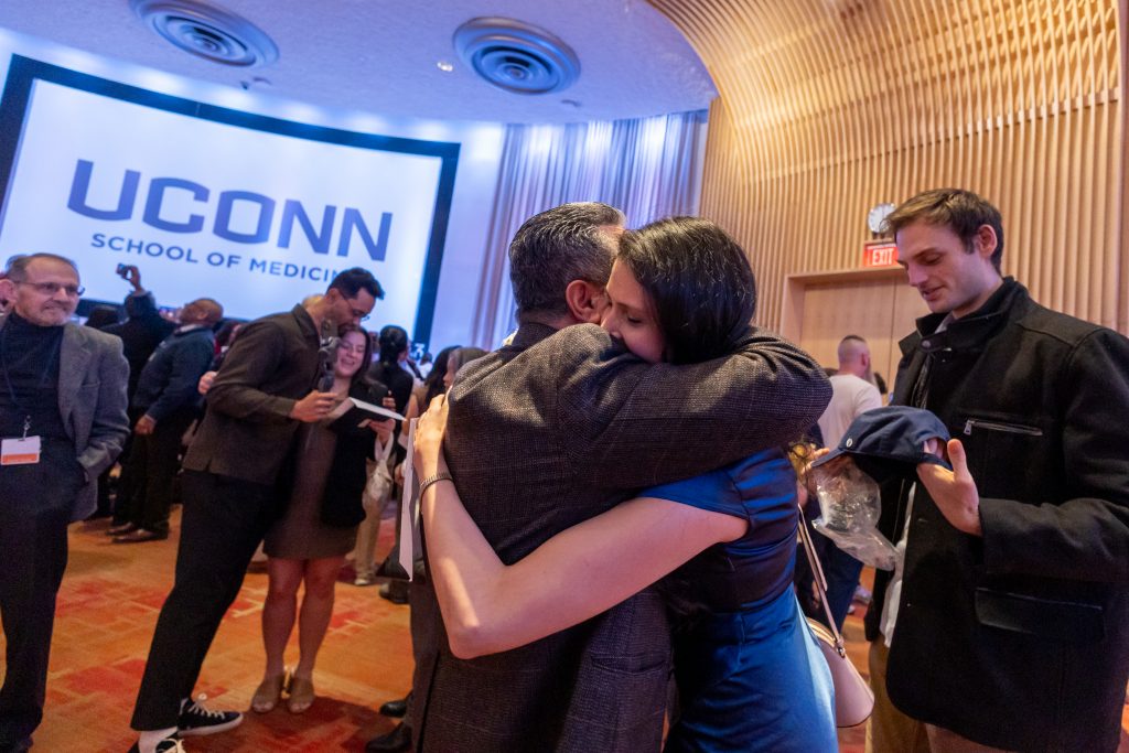 Lucia Duenas-Bianchi hugging her father after matching at UConn! (Sydney Herdle/UConn Photo)