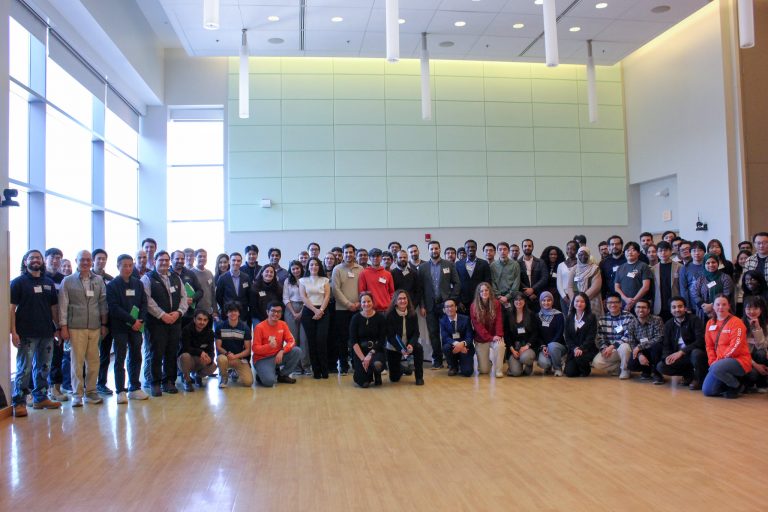 Graduate students, faculty, and judges gather for a group photo at the 12th Annual UConn Engineering Graduate Poster Competition.