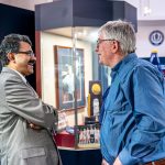 CAHNR Interim Dean Kumar Venkitanarayanan speaks with Prides Corner President and Owner Mark Sellew.