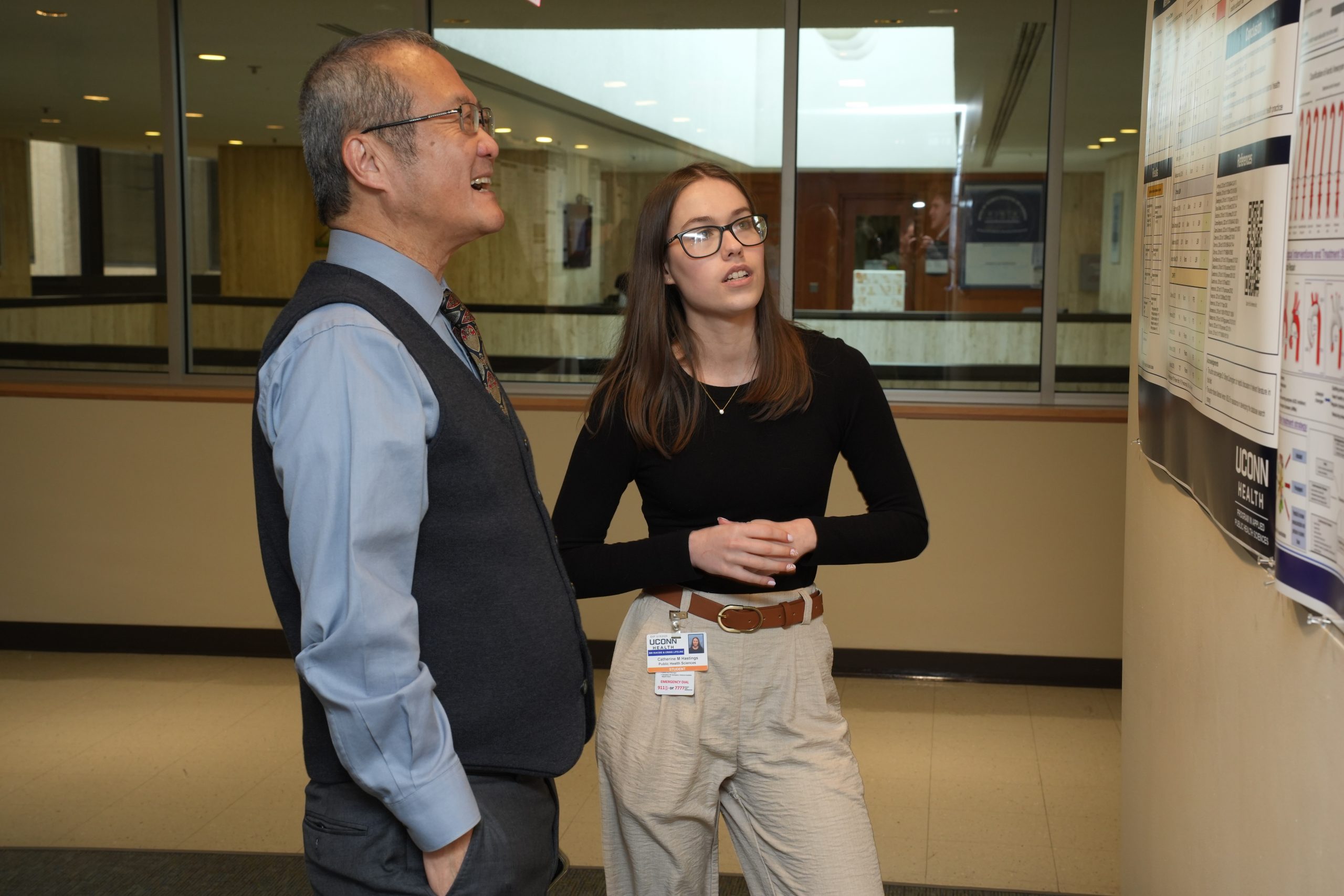 Dean of UConn School of Medicine, Dr. Bruce T. Liang, enjoying learning about the various research poster findings on March 13, 2026.