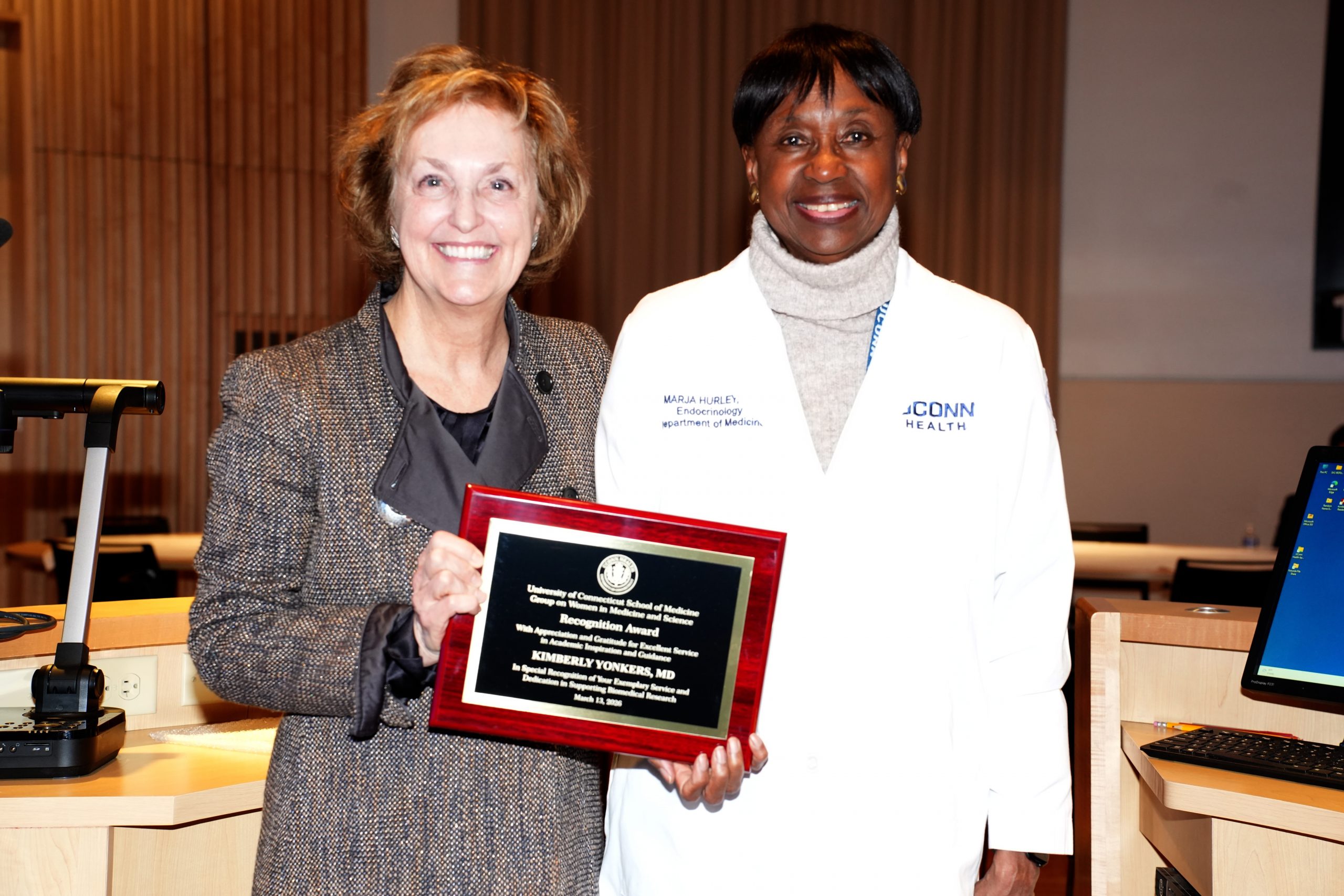 Dr. Marja Hurley honoring keynote speaker Dr. Kimberly Yonkers on March 13, 2026.