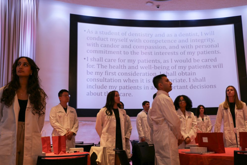 students in white coats