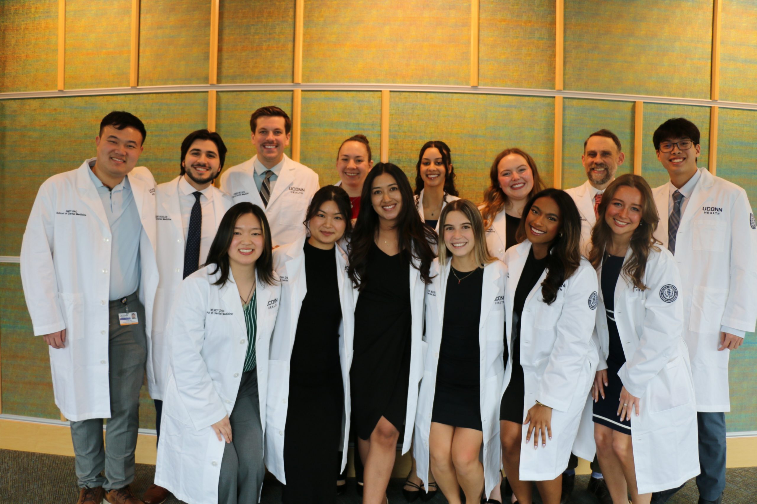 students in white coats