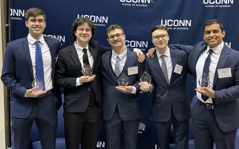 A team of finance students from the Stamford campus took first place in the CFA Research Challenge last week. Pictured from left are: Dylan Haig, Philip Ochocinski, Hunter Baillargeon, Richard Opper, and Rushit Chauhan, all members of the Class of 2026.