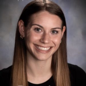 A headshot of a woman