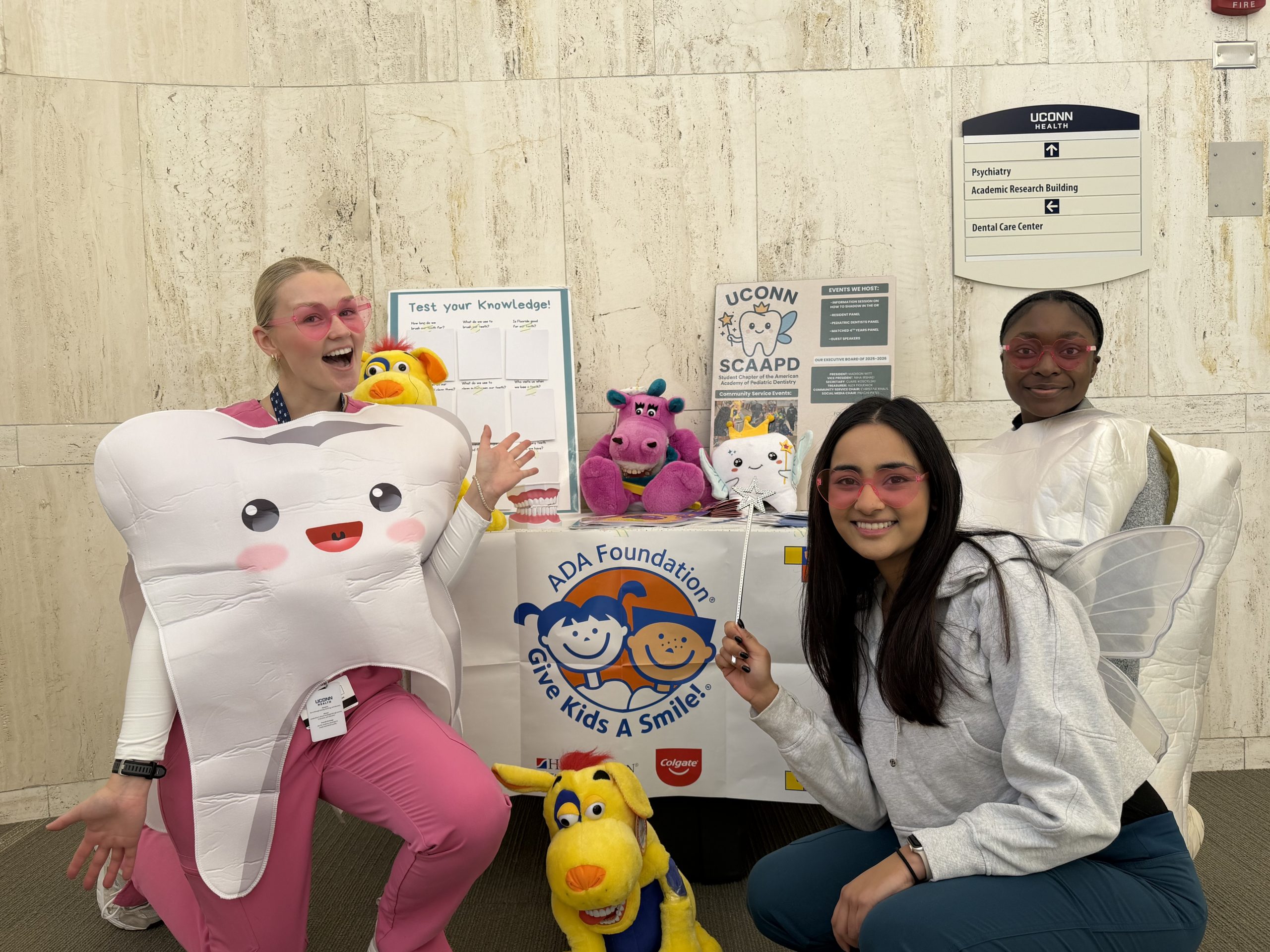 three female students with table