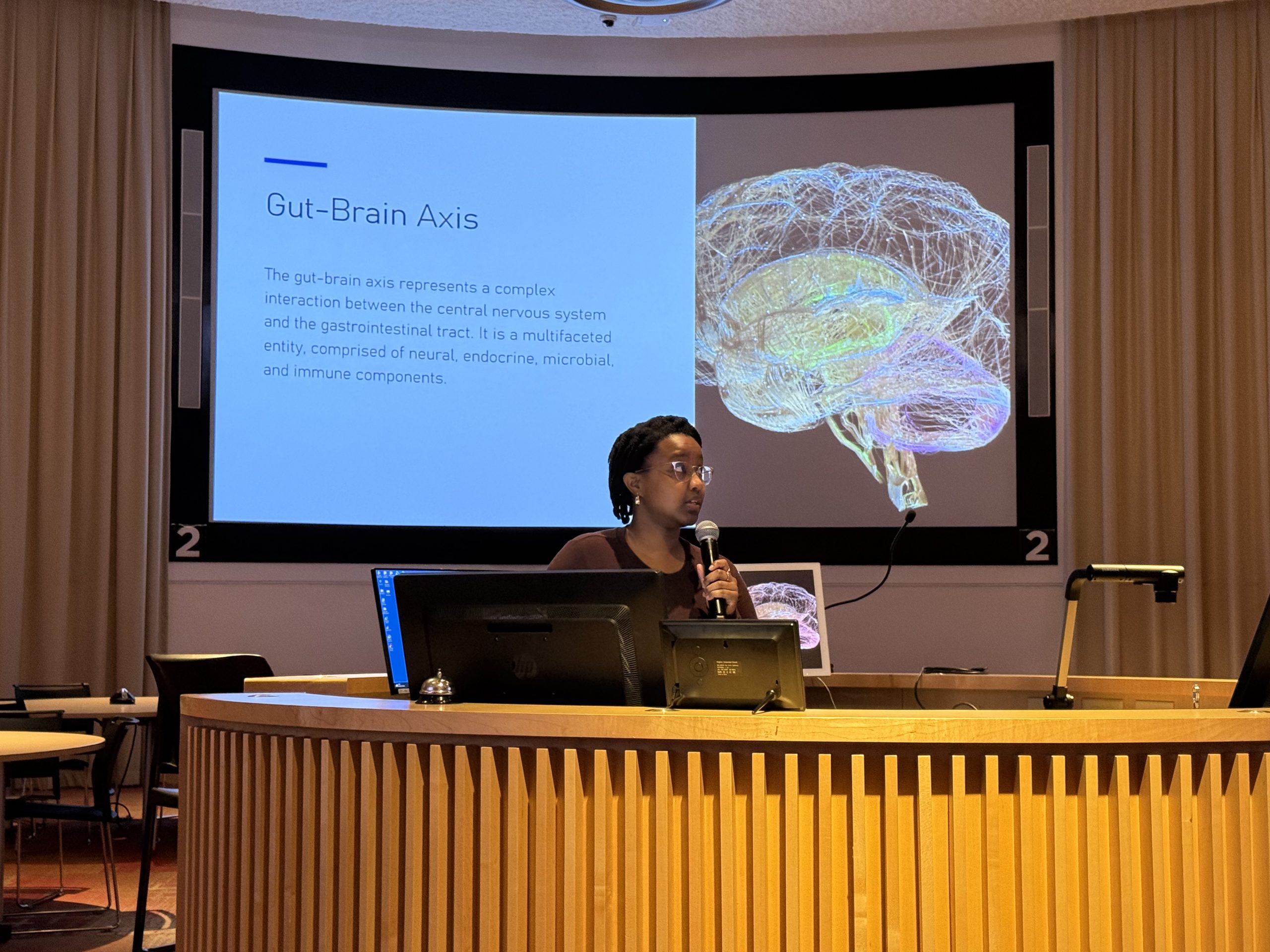 Class of 2026 medical student Chelsea Rutagengwa presenting