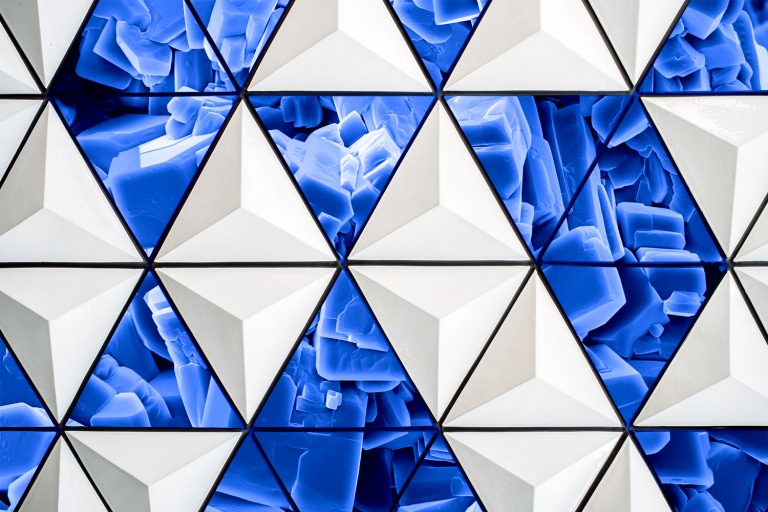 A composite image of crystal and geometric patterns.