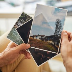 hand with photographs