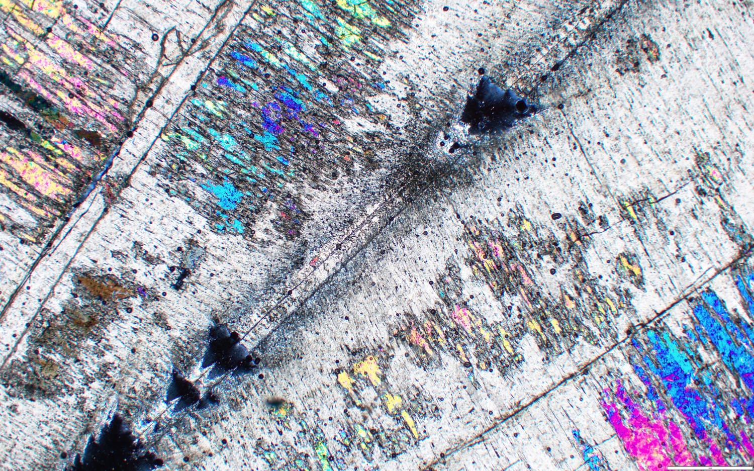 A prismatic close-up shape with rainbow sheen