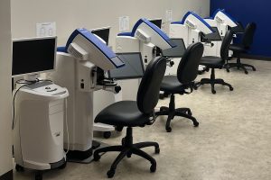 four dental simulation chairs