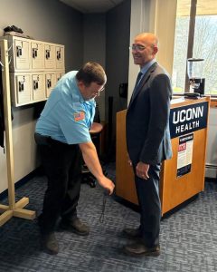 security officer wands Dr. Andy