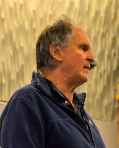 Peter Canning speaking at podium