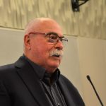 Bob Howe speaking at podium