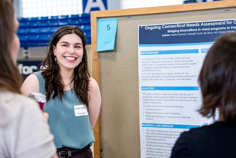 Female student presents research at CAHNR's annual Graduate Research Forum